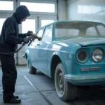 Applying Fresh Paint During an APS Car Body Repair