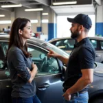 Customer Asking Questions at Auto Glass Repair Shop