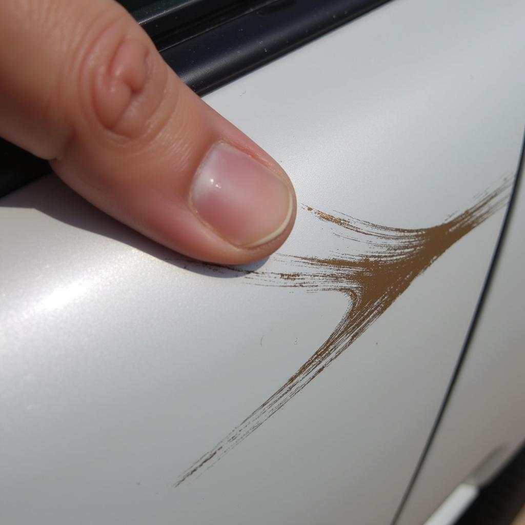 Assessing car paint scratch depth