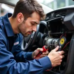 Technician Working on Car AC System