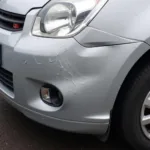 Car with significant body damage in Kilmarnock needing professional repair