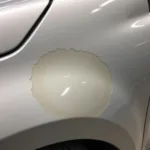 Car Body Patch Repair Showing Dull Paint Due to Improper Blending