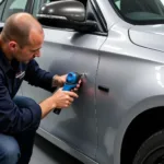 Dent removal on a car in Bristol UK