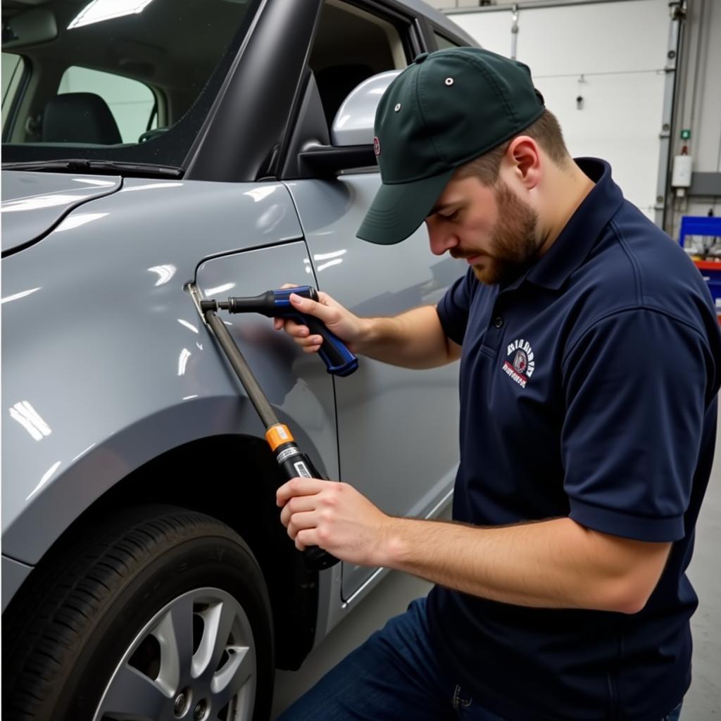 Car body repair in Cinderford showing dent repair process