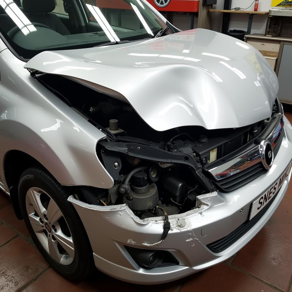 Car with significant damage after an accident in Dunfermline, requiring extensive body repairs.