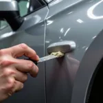 Filling a Small Hole in a Car Body