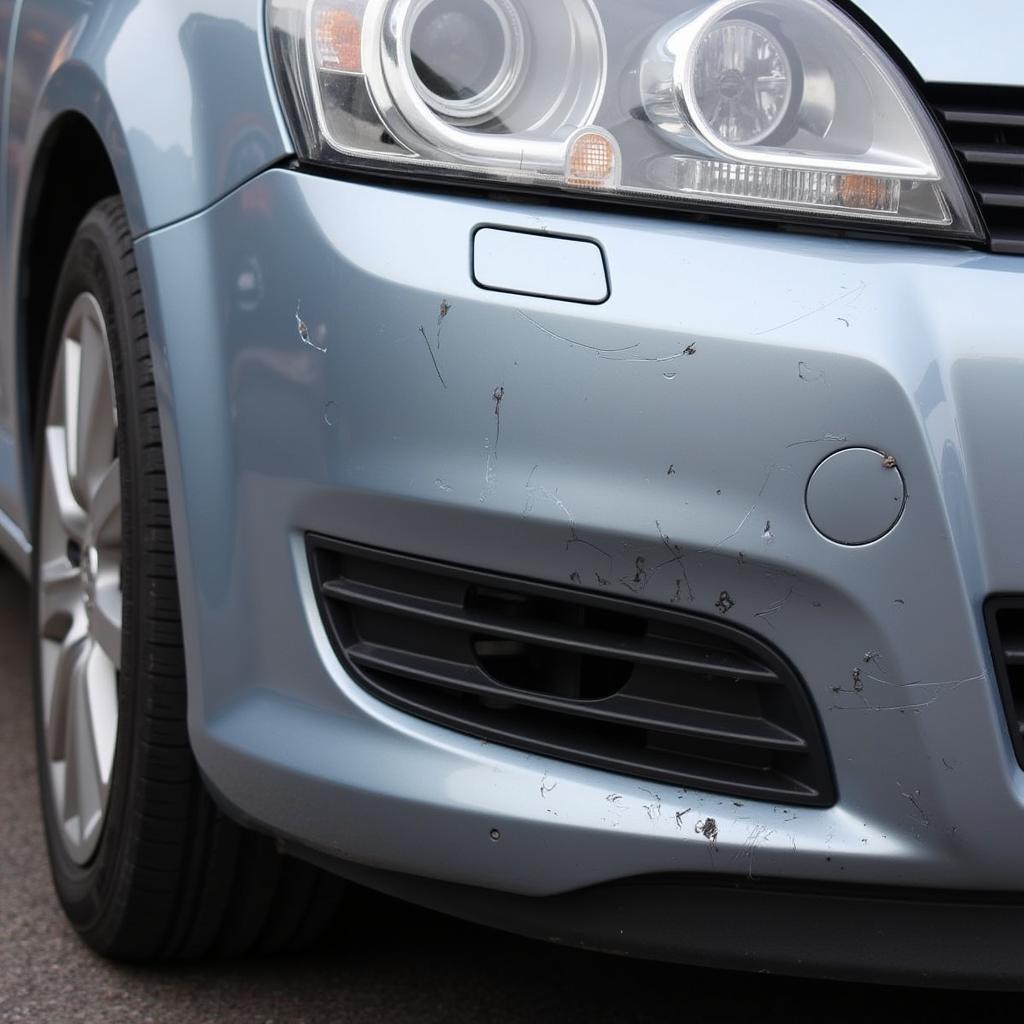 Damaged bumper on a car in need of repair in Hawkinge