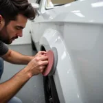 Sanding a Car Body Repair Patch