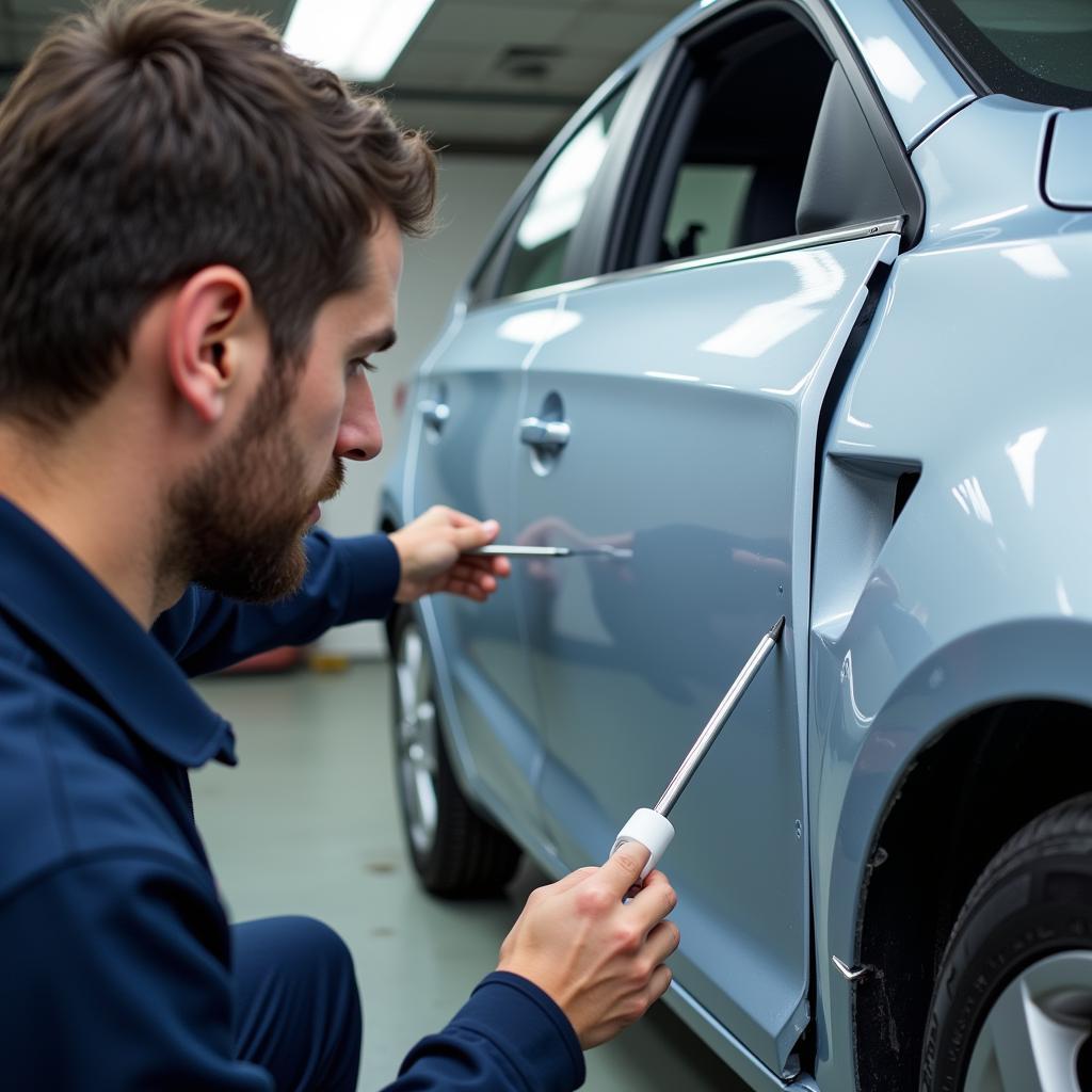 Final quality check after car body repair.