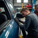 Car body repair shop in Middlesbrough working on a damaged vehicle