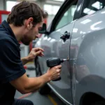 Dent Repair in a Car Body Repair Shop in Oxford