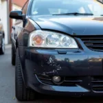 Car with a damaged bumper in Southampton needing repair