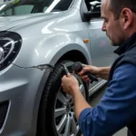 Car Body Repairs Bangor NI: Dent Repair on a Silver Car