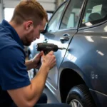 Dent repair process in a Truro body shop