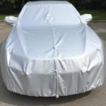 Car covered with a protective cover