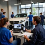 Students participating in a car diagnostic training course in South Africa