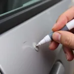 Applying Car Key Scratch Repair Pen