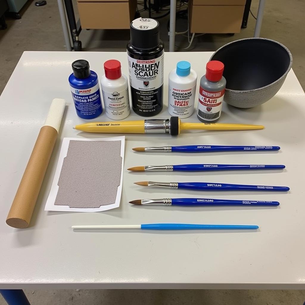 Contents of a typical car paint repair kit spread out on a table