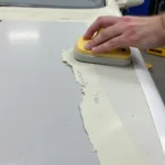 Preparing the car surface for spray paint application