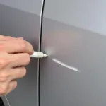 Applying Car Scratch Repair Paint Pen