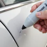 Applying Car Scratch Repair Pen