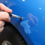 Applying Touch-Up Paint to a Car Scuff