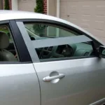 Car Window Secured with Duct Tape as Temporary Fix