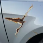 Chipped Car Paint Leading to Rust Damage