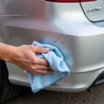 Cleaning a Scuffed Car Bumper Before Repair