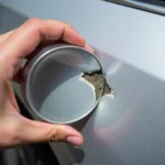 Assessing a Deep Paint Chip on a Car