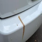 Deep Scratch on a Car Bumper