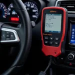 Diagnostic scan tool connected to car's OBD port