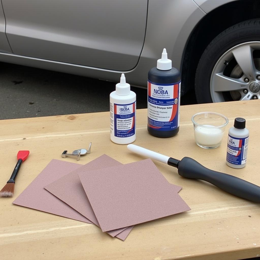 DIY cracked paint repair kit with sandpaper, primer, and touch-up paint.