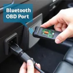 ELM327 Bluetooth Scanner Connected to Car OBD2 Port