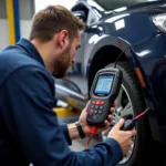 Mechanic Using a Diagnostic Tool on a Car