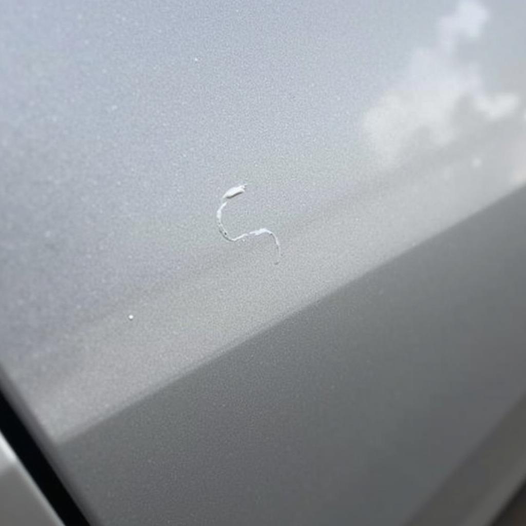 Minor scratch on a car door in Croydon