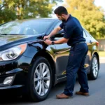 Mobile Car Body Repair Technician at Work