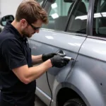 Mobile Car Paint Repair Technician Working in North London