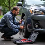 Mobile Mechanic Diagnosing Car with Diagnostic Tool