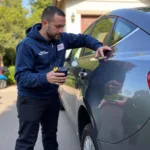 Mobile paint medic repairing a car scratch on-site