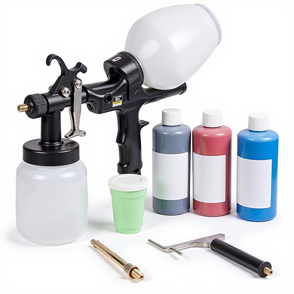 Professional Car Paint Repair Equipment: A professional spray gun and other tools for car paint repair, highlighting the specialized equipment often needed for complex repairs.