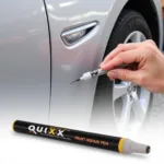 Applying Quixx Paint Repair Pen to Car Scratch