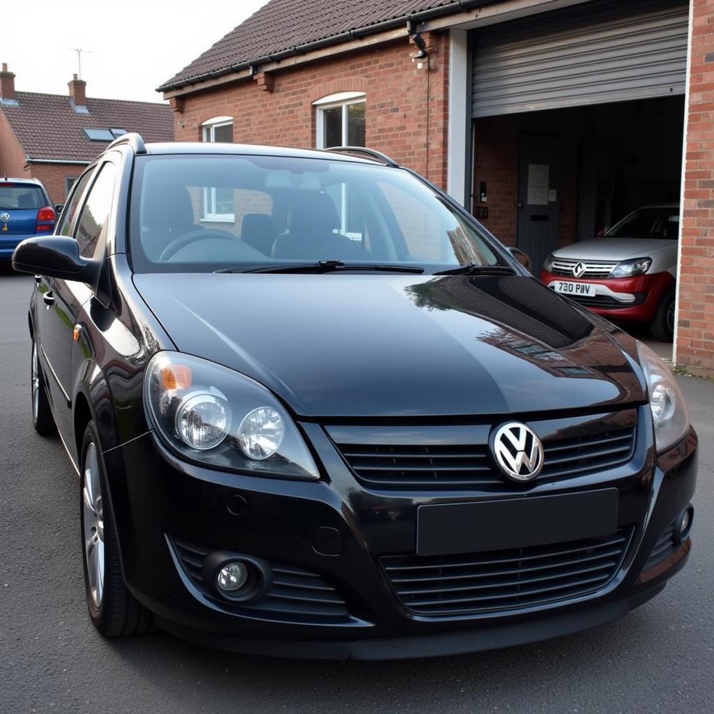 Repaired car leaving a Warrington bodywork shop