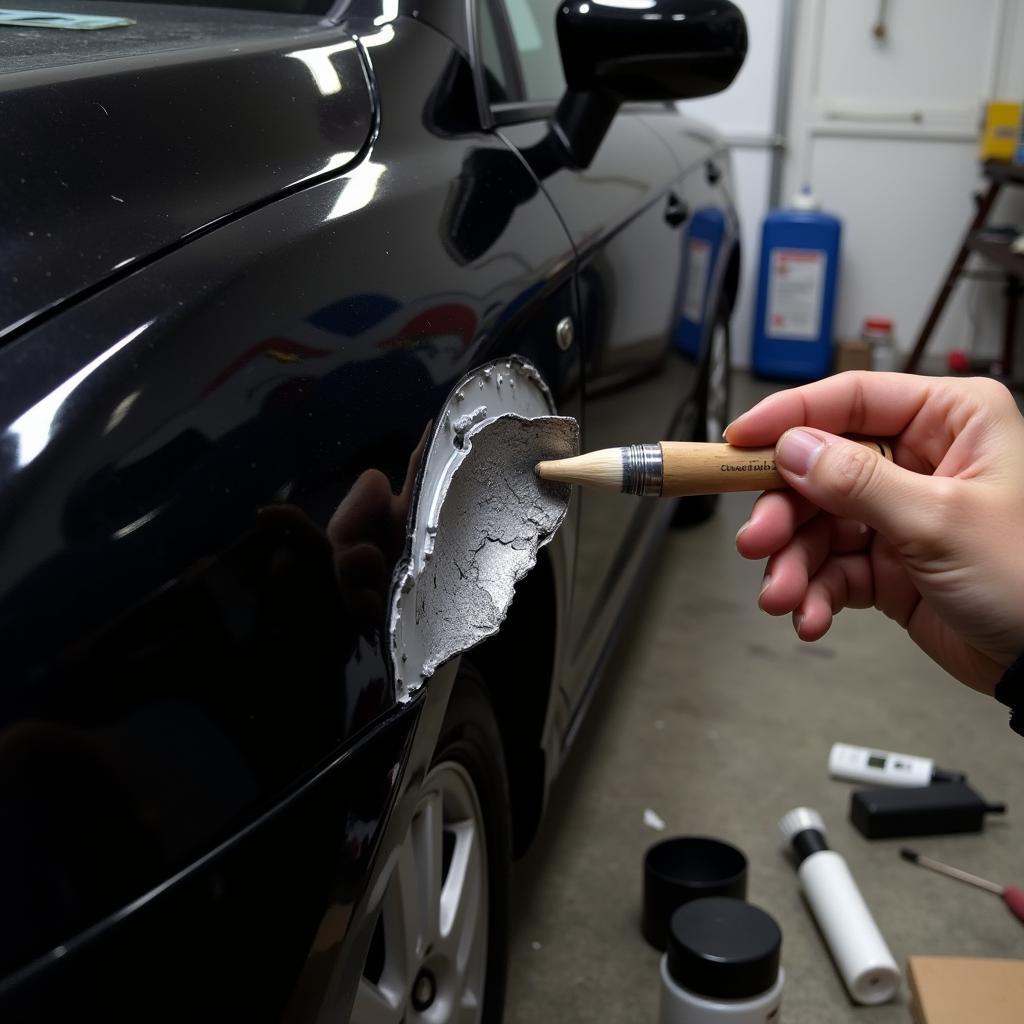 Repairing Deep Paint Chips on a Black Car