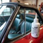 Repairing a small chip in a fiberglass hardtop convertible car window