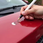 Repairing a small paint chip on a car