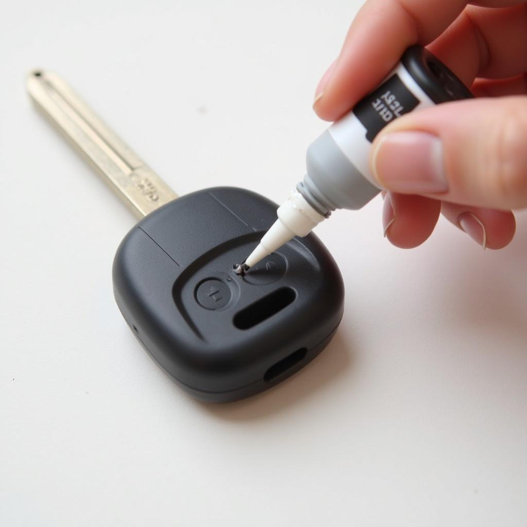 Repairing a Torn Rubber Car Key with Silicone Adhesive