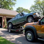 Tow truck removing a car during repossession