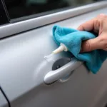 Applying Toothpaste to a Car Scratch