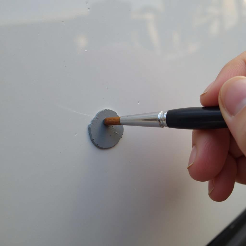 Applying Touch-Up Paint to a Car Chip